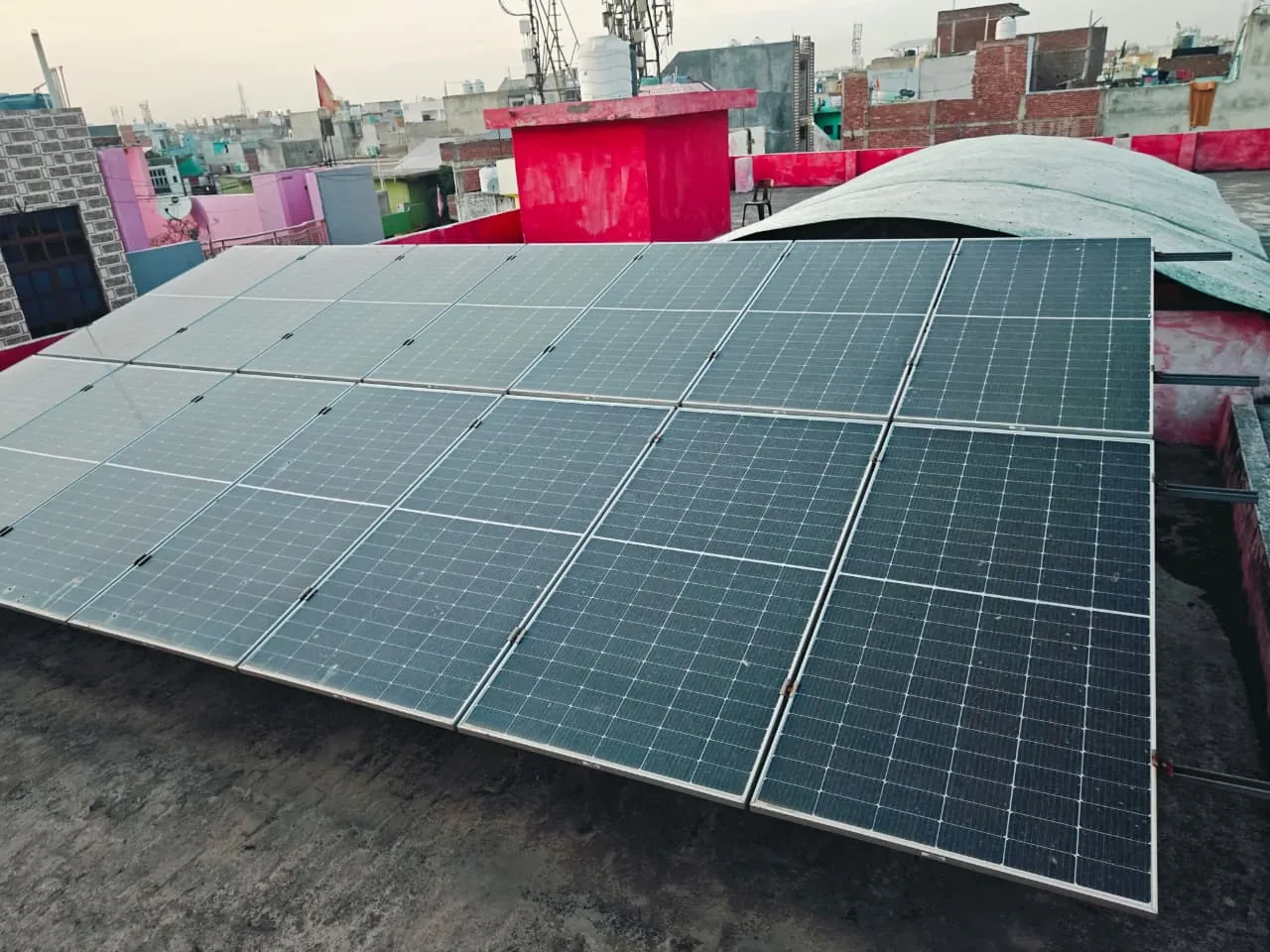 Solar panel array installed across the roof of the school